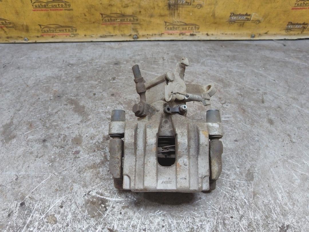 Суппорт задний правый 1NQNOQ Saab 9-3