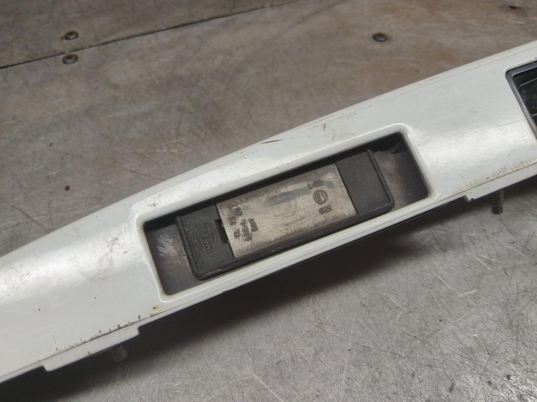 Накладка подсветки номера V1TQGT Nissan Note - Фото 3