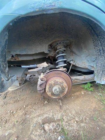 Амортизатор задний правый F63T3J Nissan Almera