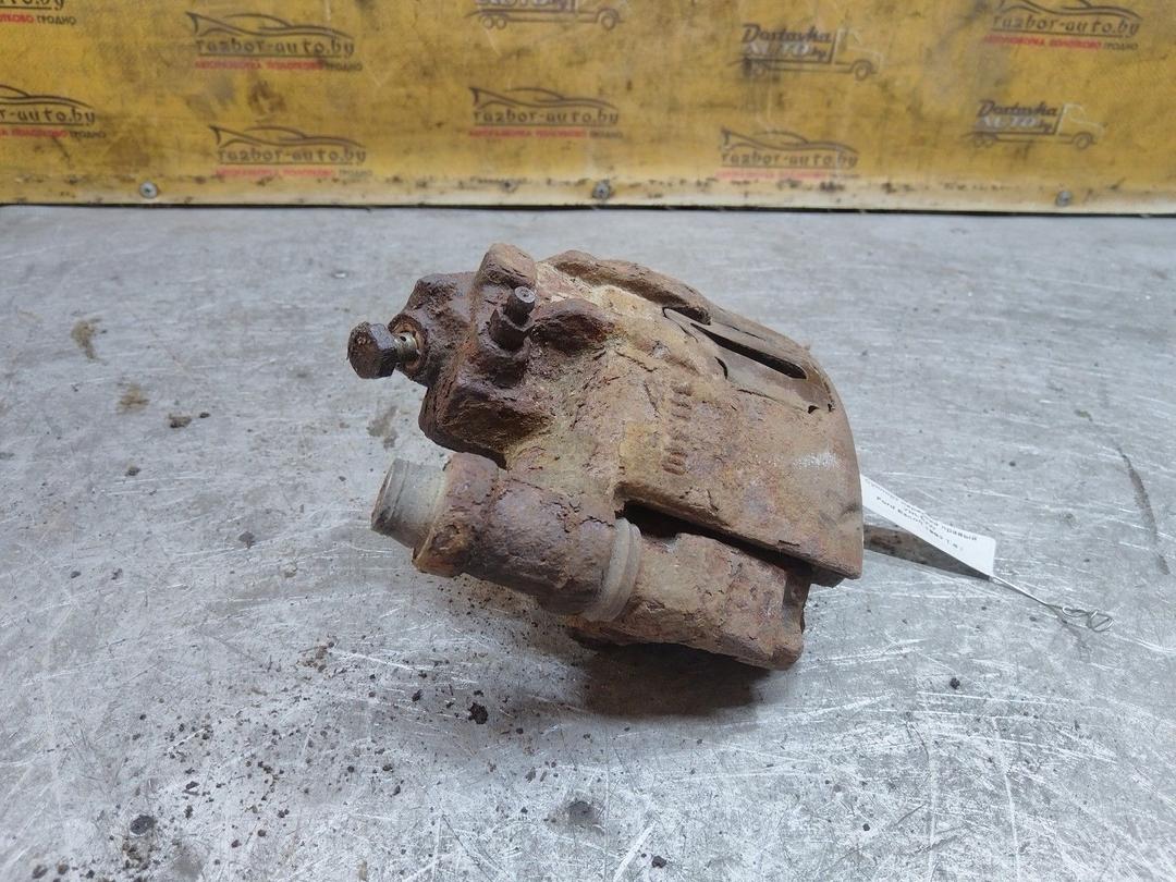 Суппорт передний правый YHL6UW Ford Escort купить на авторазборке