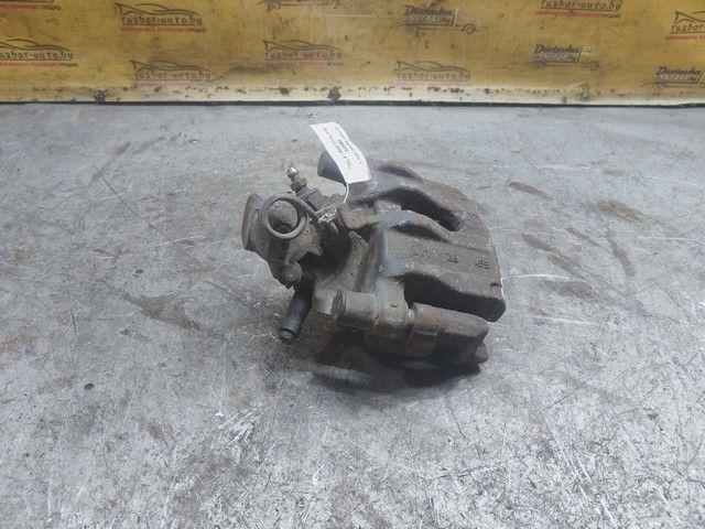 Суппорт задний левый 595NFQ Ford Focus