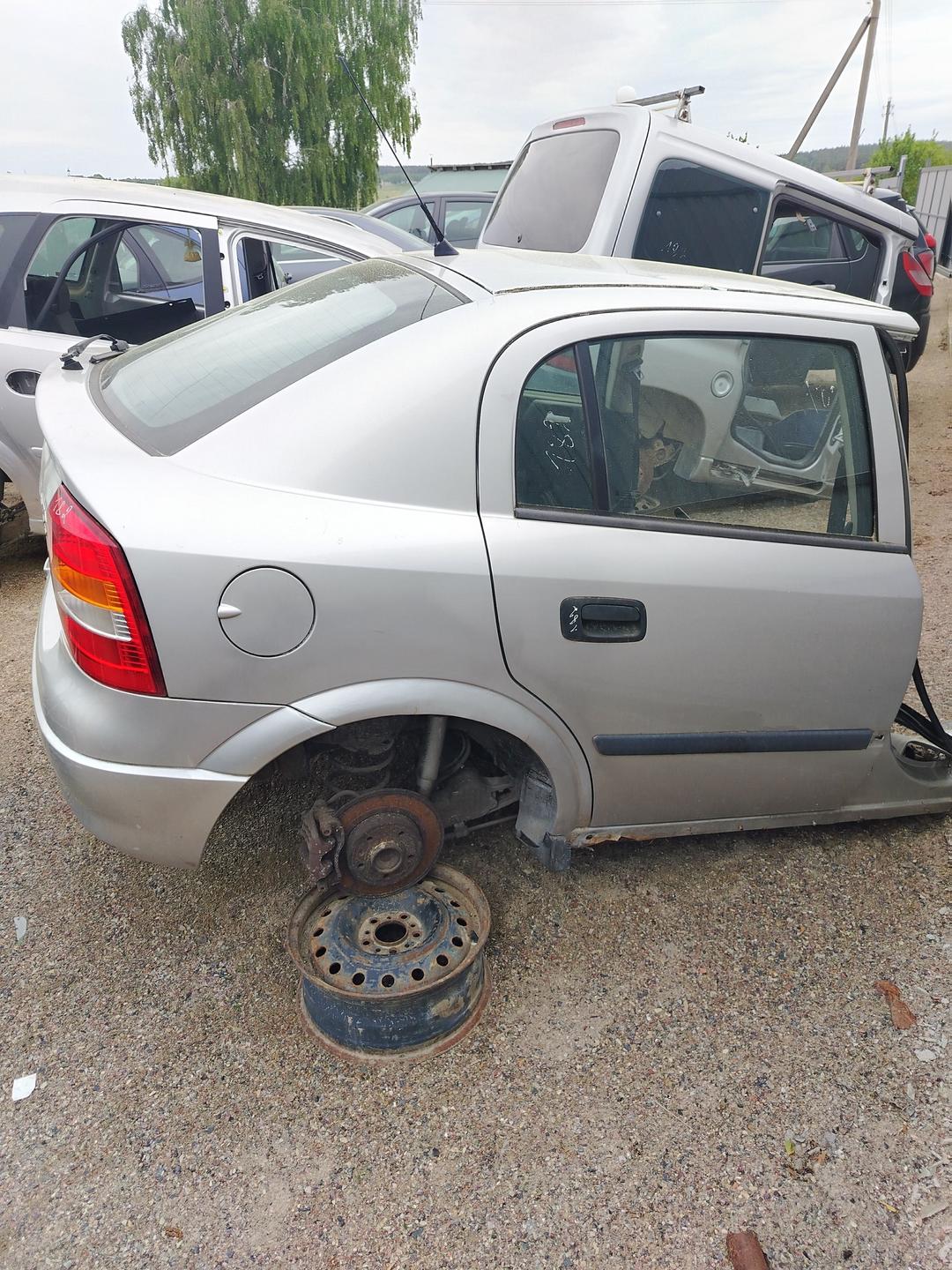 Стекло двери задней правой XRSFE1 Opel Astra