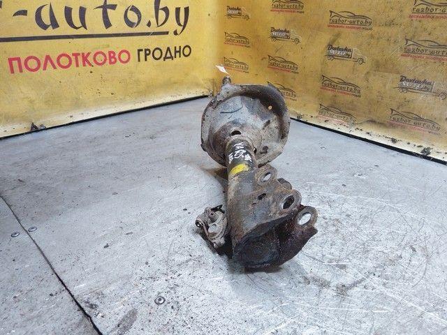 Амортизатор передний левый 7LS1Y1 Toyota Yaris купить в магазине запчастей бу