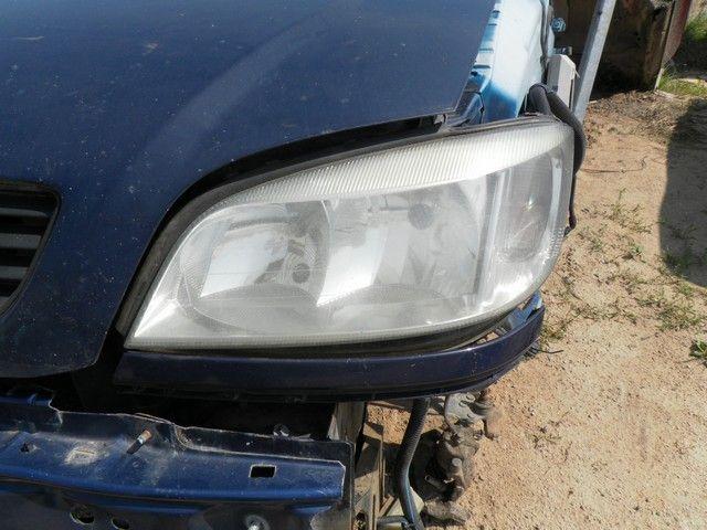 Ус под фару левый 55O0D5 Opel Zafira - Фото 2