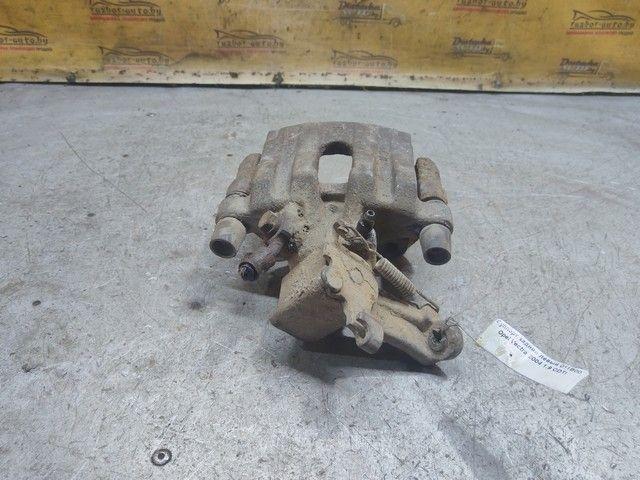 Суппорт задний левый 011B00 Opel Vectra купить