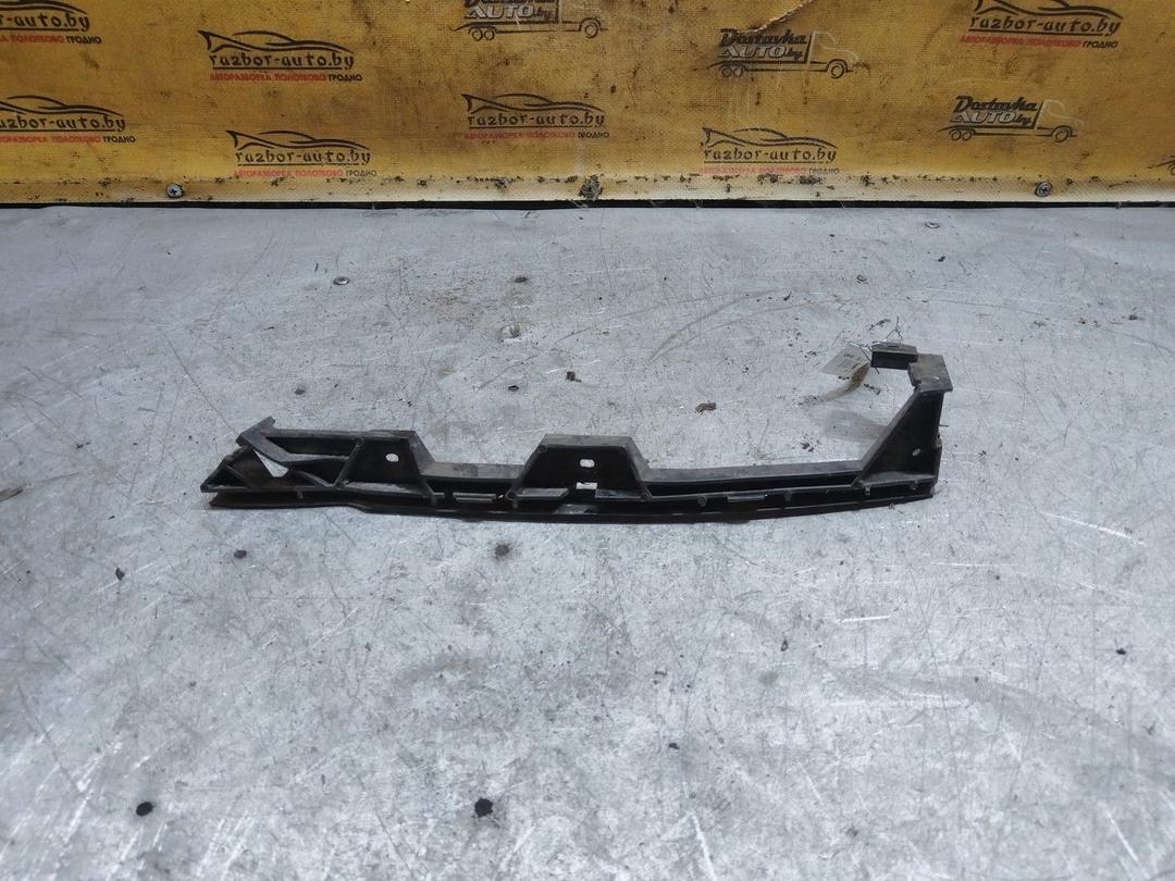 Кронштейн крепления бампера переднего UNDH02 Opel Vectra