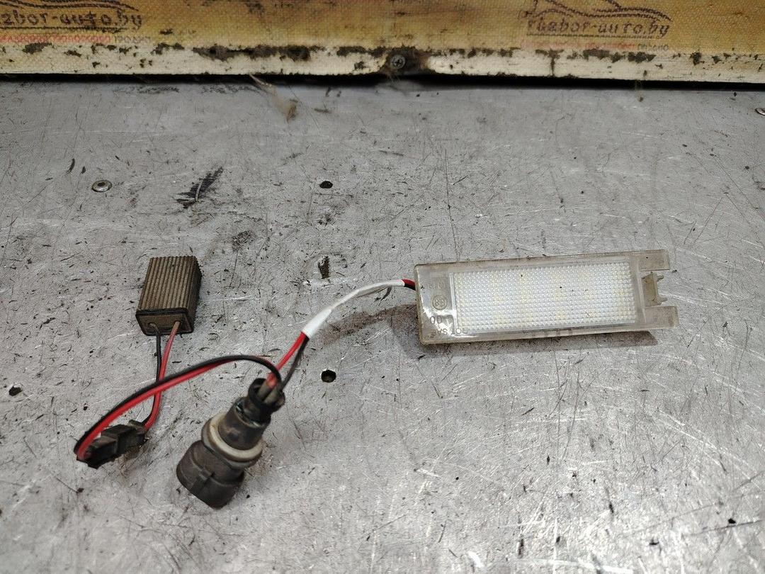 Подсветка номера E5XTUX Opel Meriva - Фото 1