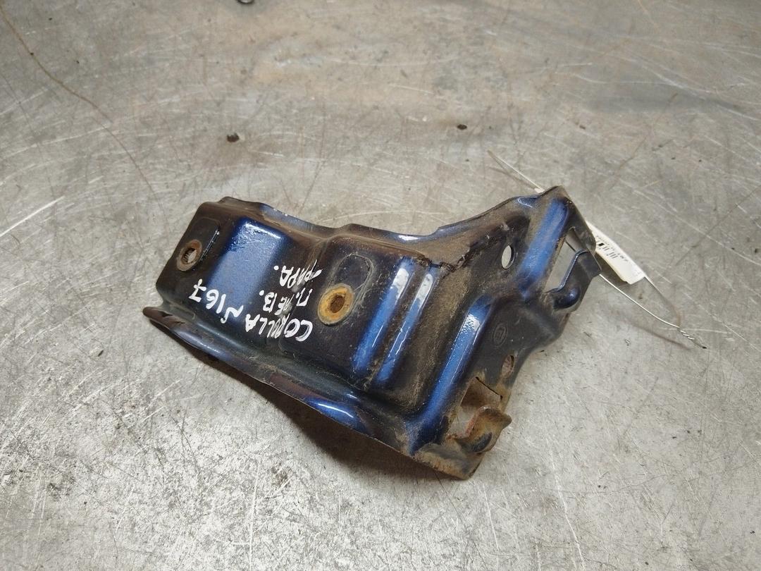 Крепление фары левой 76JG61 Toyota Corolla - Фото 1