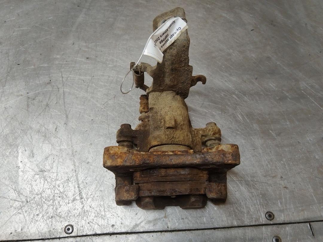 Суппорт задний левый M8FPB9 Nissan Almera купить на авторазборке