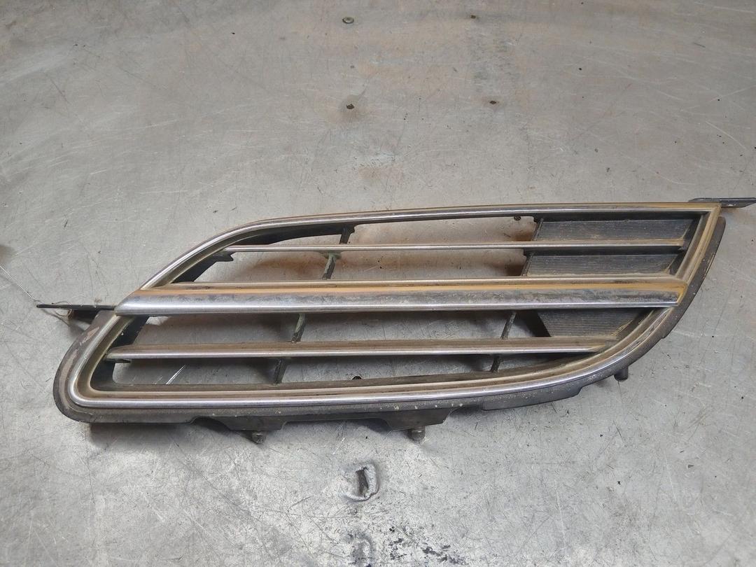 Решетка радиатора RHJ209 Nissan Almera Tino