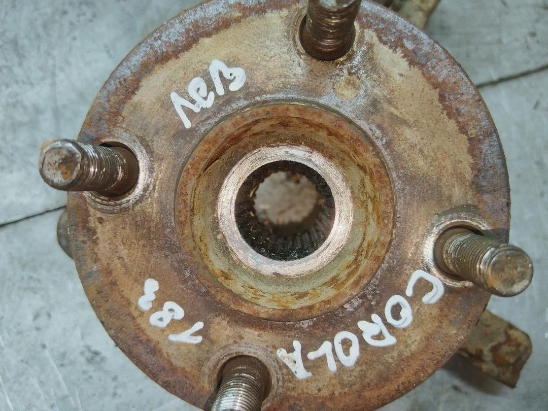 Кулак поворотный левый LY7OXT Toyota Corolla купить