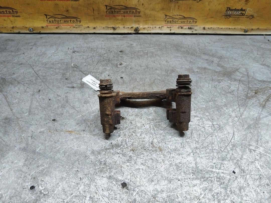 Скоба суппорта заднего F5M718 Audi 100 купить