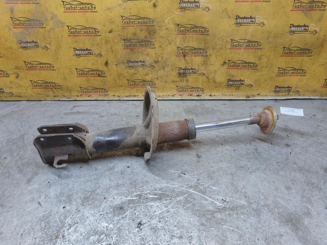 Амортизатор передний левый UE1Q48 Fiat Bravo