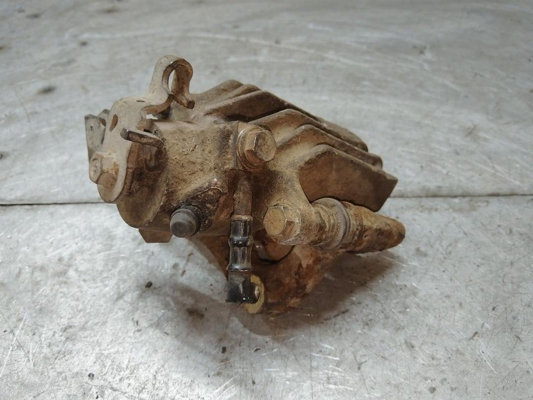 Суппорт задний левый VK6W7F Volkswagen Golf - Фото 4