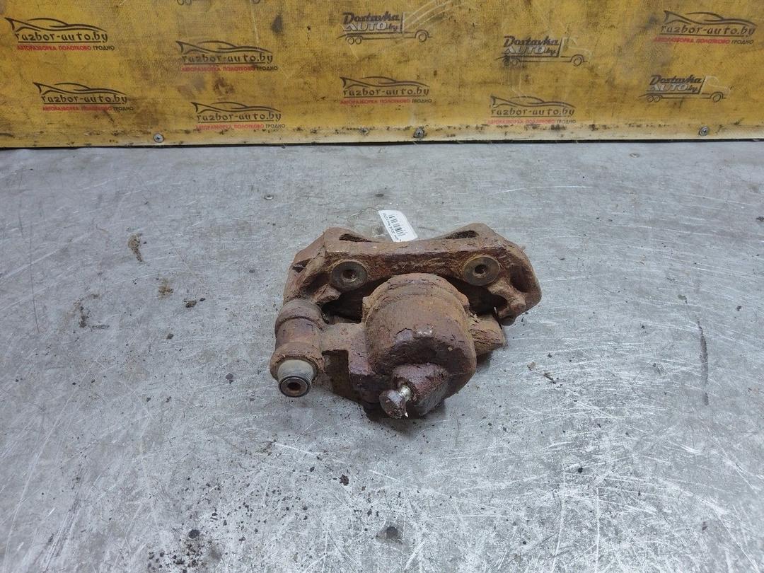 Суппорт передний правый YHL6UW Ford Escort купить с доставкой