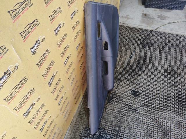 Обшивка двери задней левой (дверная карта) AXWC26 Toyota Corolla купить