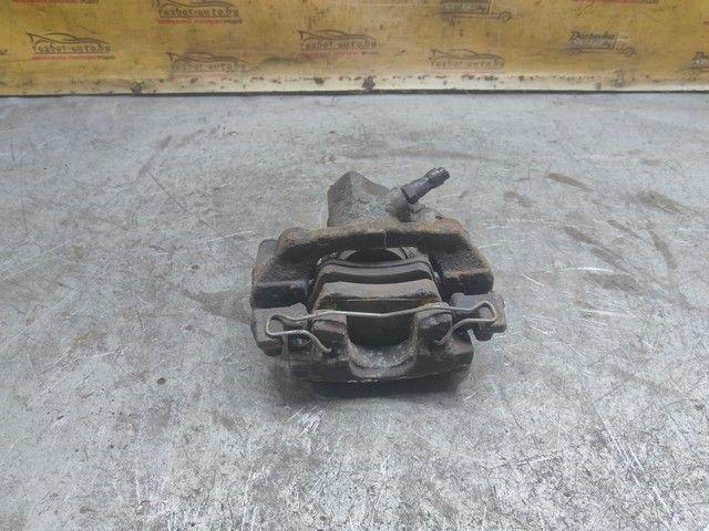 Суппорт задний левый 595NFQ Ford Focus купить на авторазборке