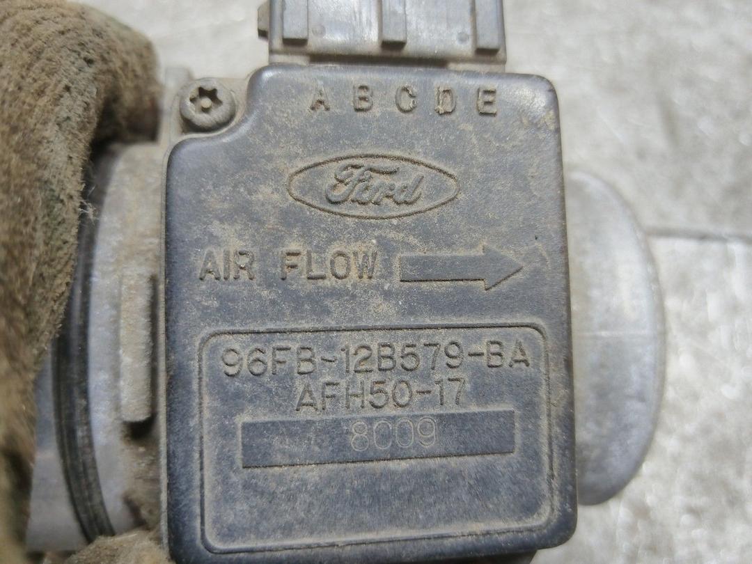 Расходомер воздуха 3XFWC7 Ford Escort купить в магазине запчастей бу