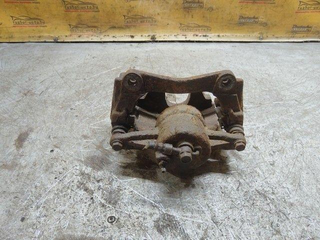 Суппорт передний правый UQS19K Toyota Avensis купить в магазине запчастей бу