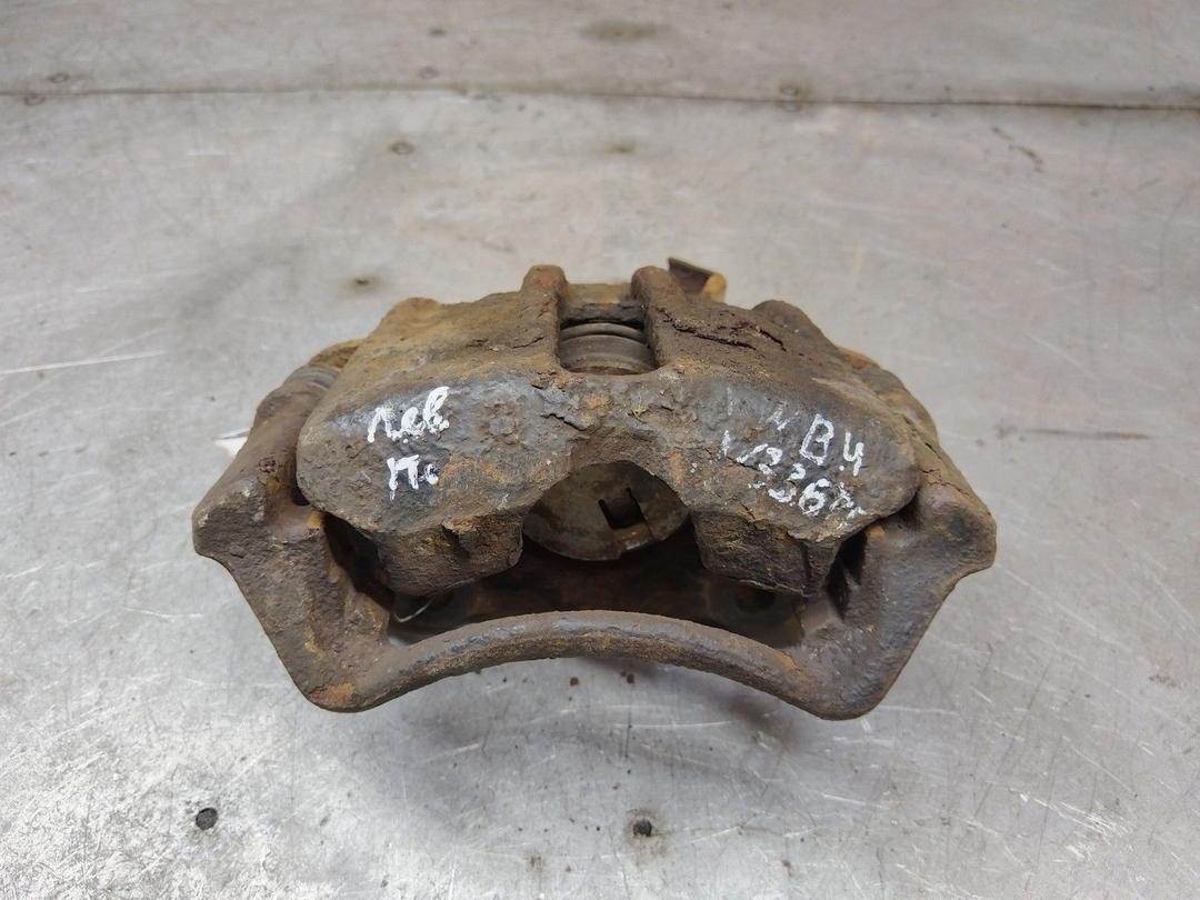 Суппорт передний левый 1KJ43R Volkswagen Passat