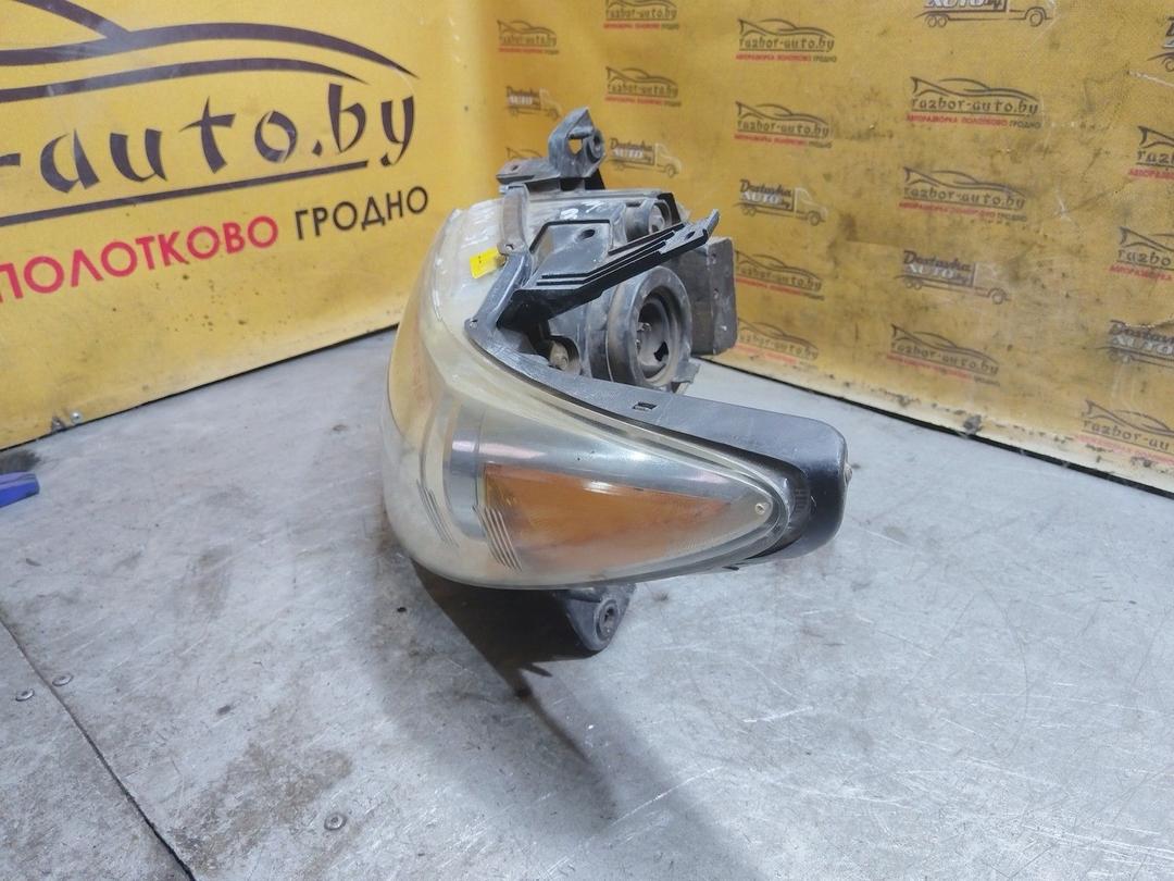 Фара левая E0B066 Mazda MPV купить в магазине запчастей бу