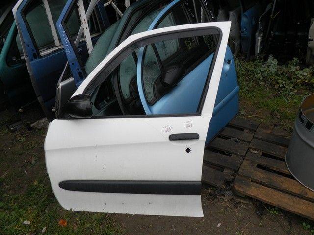 Стекло двери передней левой UKYT91 Citroen Xsara Picasso