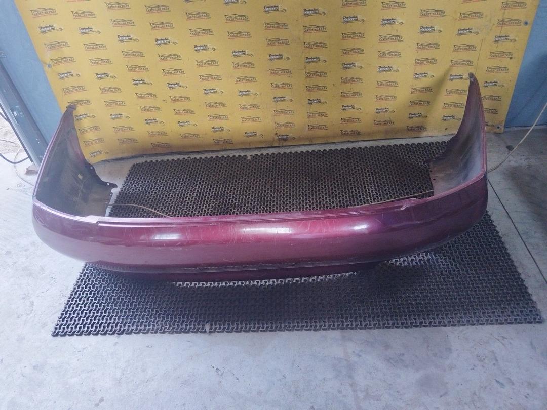 Бампер задний 055RE3 Mitsubishi Carisma