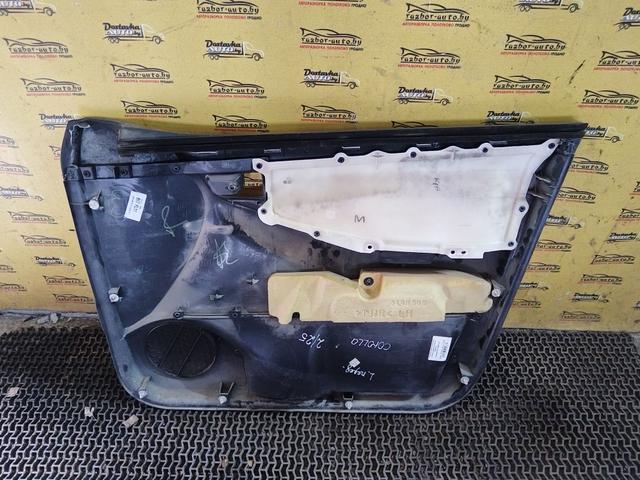 Обшивка двери передней левой (дверная карта) OF47S4 Toyota Corolla купить на авторазборке
