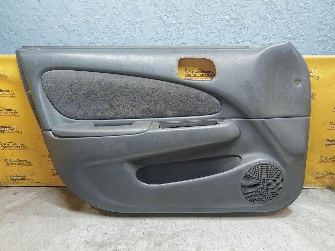 Обшивка двери передней левой (дверная карта) A5MCAS Toyota Corolla купить