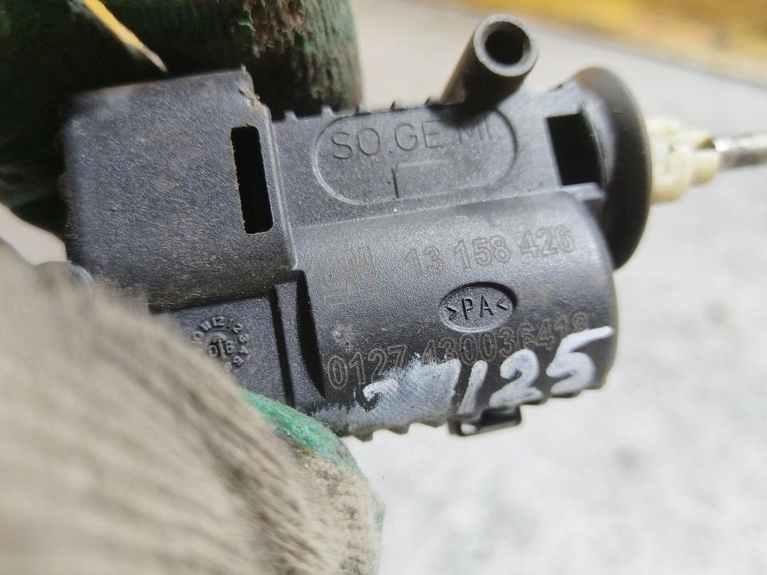 Активатор замка крышки топливного бака G1N329 Opel Astra купить в магазине запчастей бу