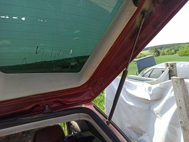 Амортизатор крышки багажника (3-5 двери) D3KU9A Volkswagen Passat