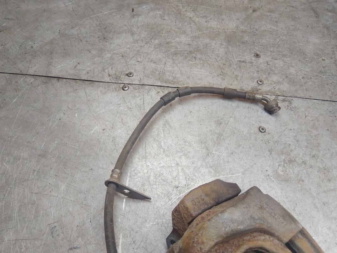 Суппорт передний левый ZU92OL Ford Fusion undefined