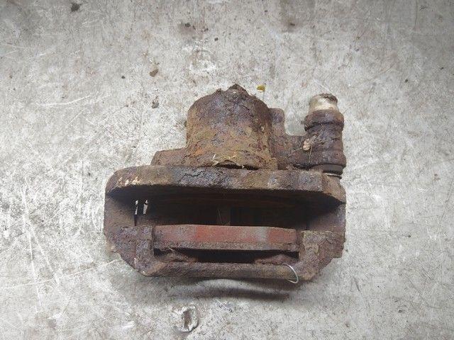 Суппорт передний правый E0WKYG Ford Escort купить в магазине запчастей бу