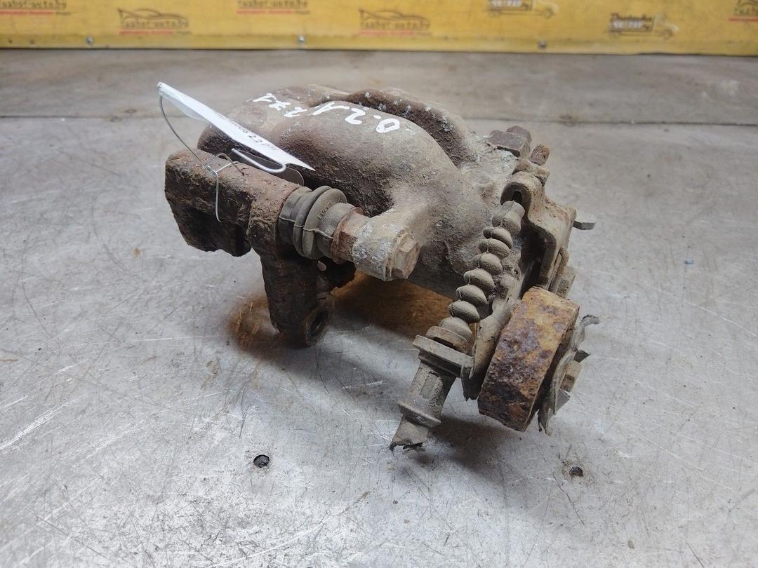 Суппорт задний левый 0W0TYV Opel Zafira купить