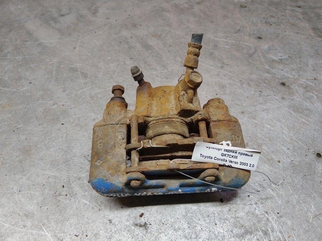 Суппорт задний правый GK7CKM Toyota Corolla Verso