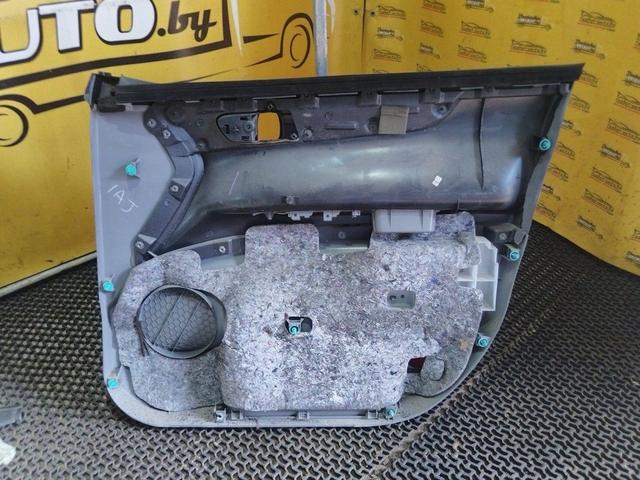 Обшивка двери передней левой (дверная карта) EA52MT Toyota Avensis Verso купить
