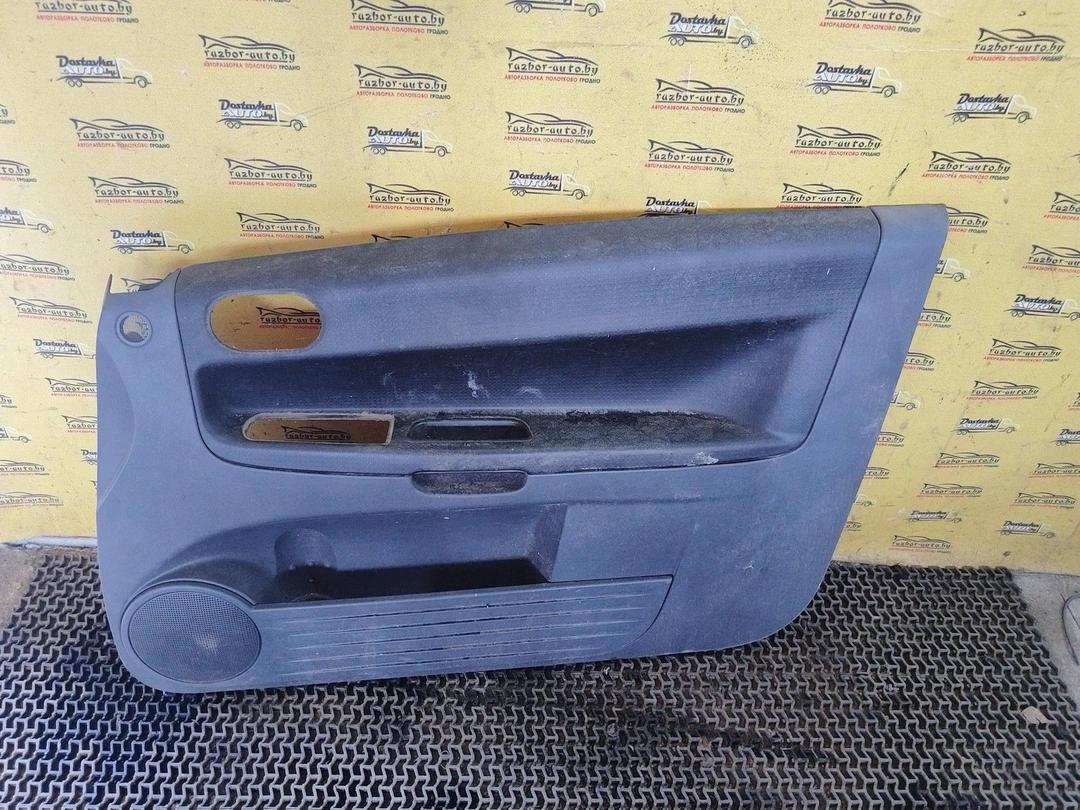 Обшивка двери передней правой (дверная карта) 2TPEBB Mitsubishi Colt