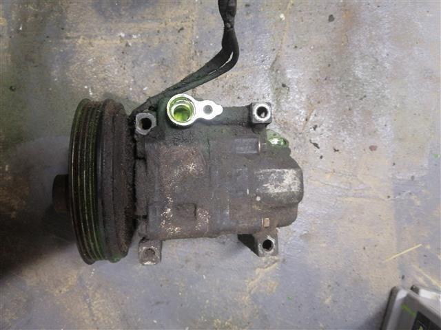 Компрессор кондиционера 75C9CC Mazda 323 купить