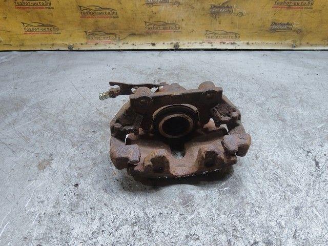 Суппорт передний левый B303EC Volkswagen Passat купить в магазине запчастей бу