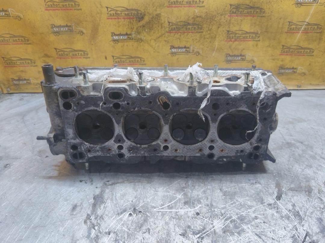 Головка блока цилиндров 9AI65F Mazda 323 купить в магазине запчастей бу