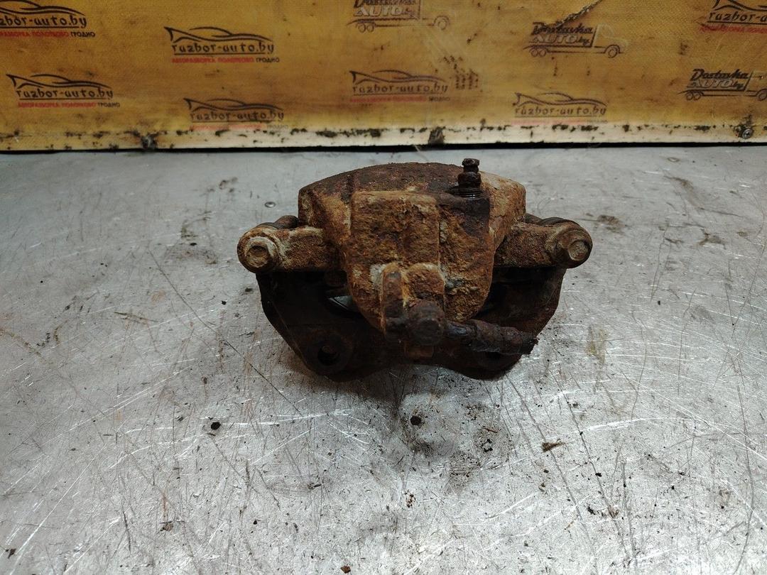 Суппорт передний правый L62K3K Nissan Primera - Фото 3