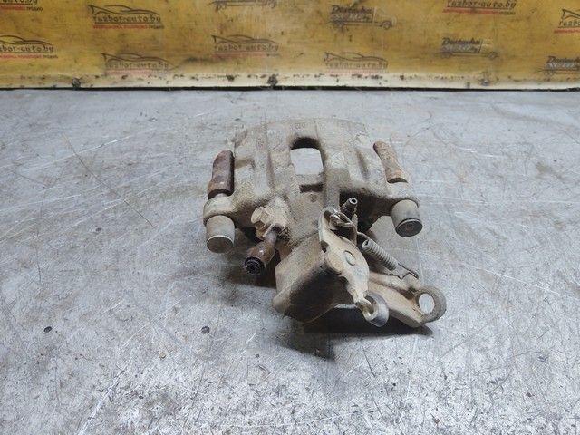 Суппорт задний левый ZSCN68 Saab 9-3 купить