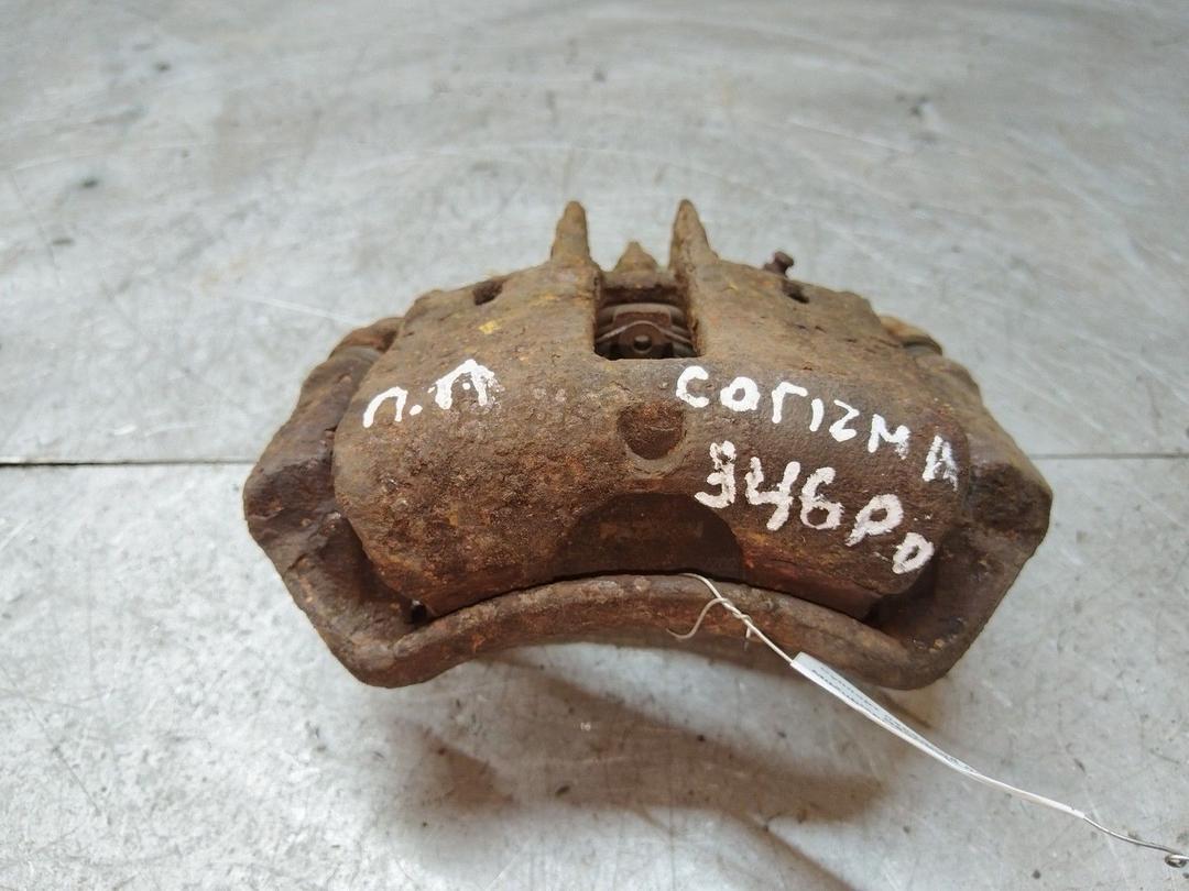 Суппорт передний левый O90OEM Mitsubishi Carisma