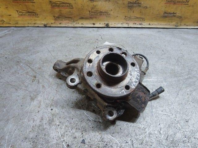 Кулак поворотный левый QXE75N Opel Vectra