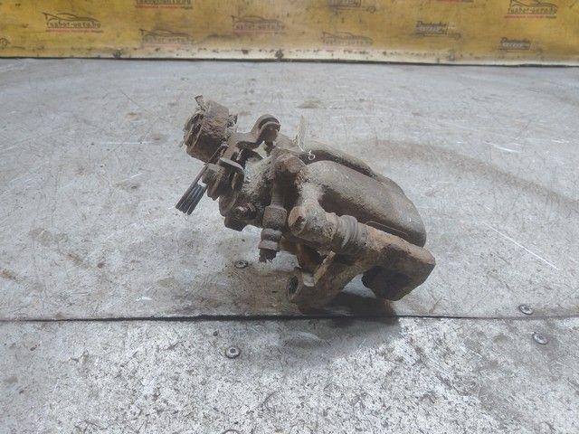 Суппорт задний левый X0WN61 Opel Astra