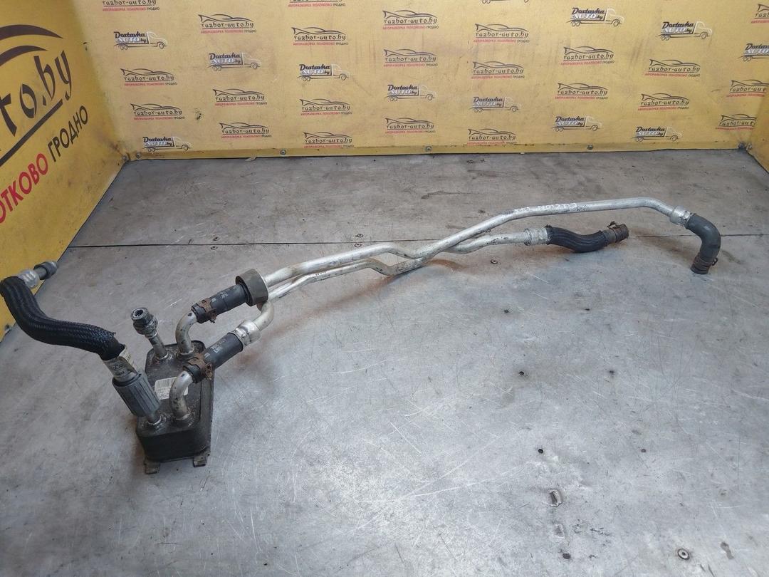 Радиатор масляный E9F7VT Ford Fusion