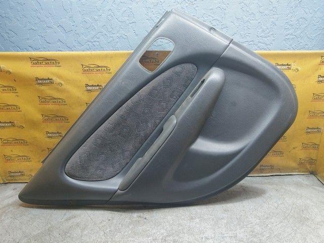 Обшивка двери задней левой (дверная карта) 13W7FK Toyota Corolla купить