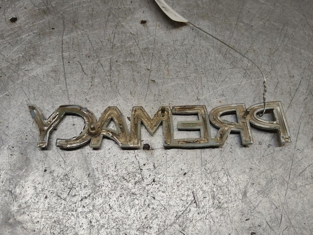 Эмблема LC047F Mazda Premacy - Фото 2