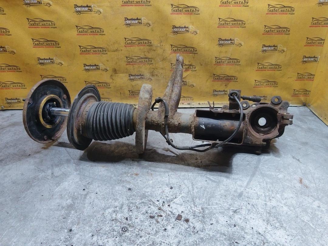 Кулак поворотный левый 1X5HJY Audi 100 купить в магазине запчастей бу