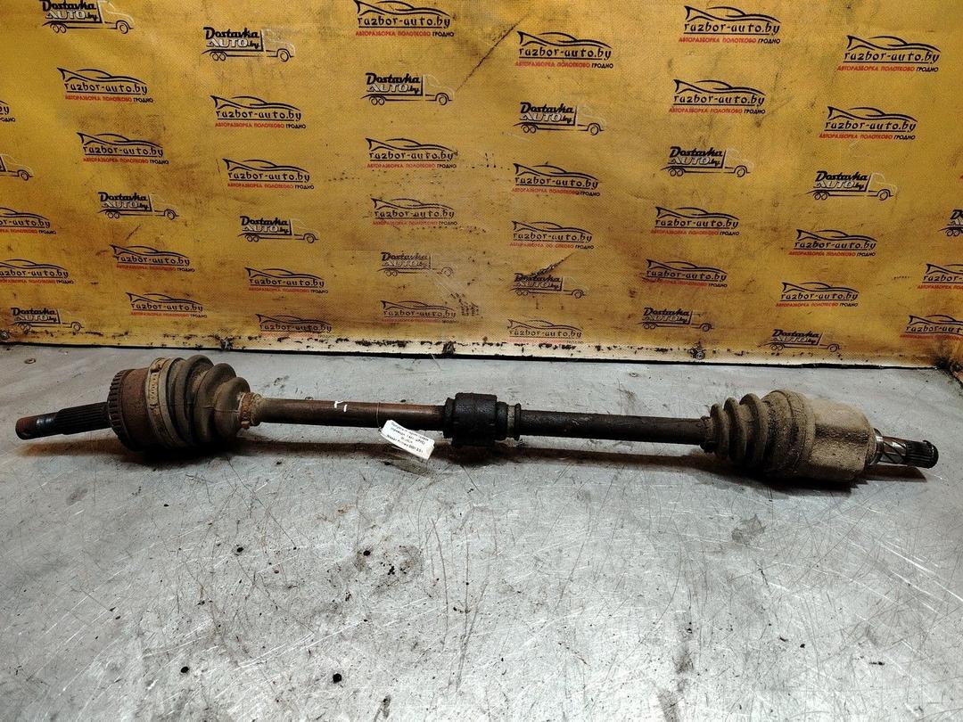 Полуось передняя правая (приводной вал, ШРУС) 0KUNLH Nissan Primera - Фото 1